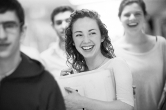 Girl in Hallway with Friends