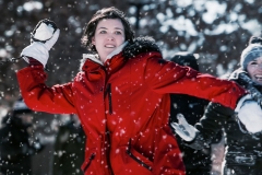 Red Jacket Throwing SnowBall